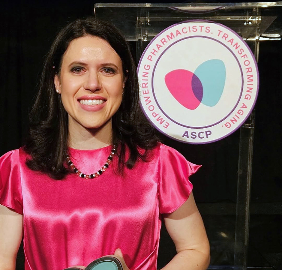 EmilyKryger headshot with award
