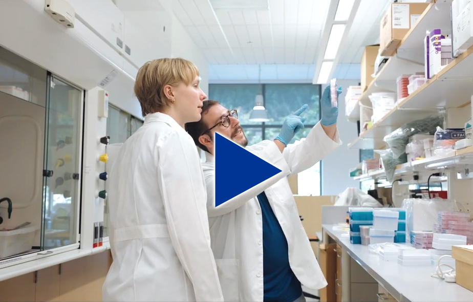 Professor with student in lab.