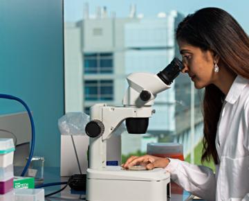 Women using microscope