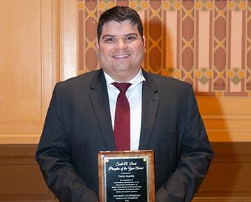 Carlo Iasella Headshot with award